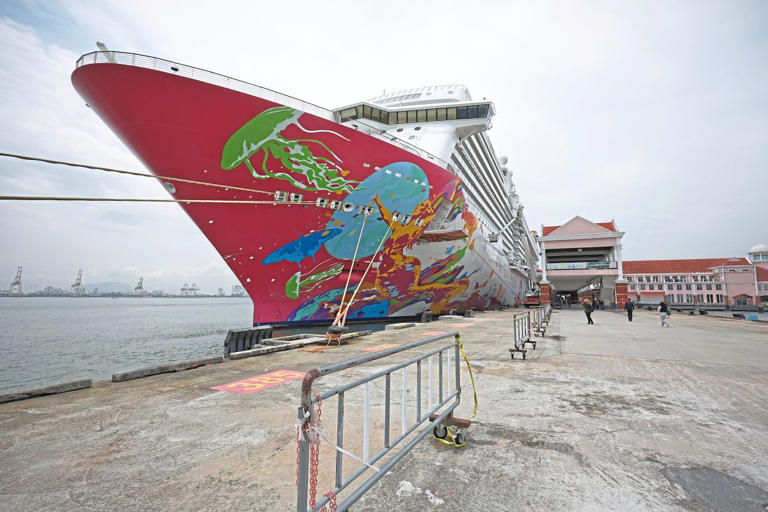 Resorts World Cruises Genting Dream docking at Penang’s Swettenham Pier Cruise Terminal. — Photos: CHAN BOON KAI/The Star