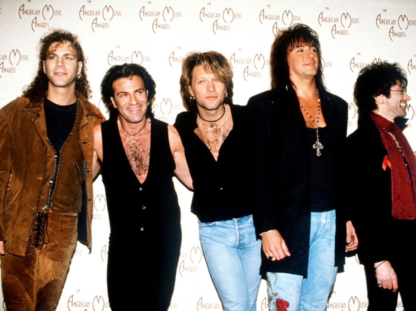 <p>       If you purchase an independently reviewed product or service through a link on our website, SheKnows may receive an affiliate commission.    </p>  <p>With four decades under their belt, Bon Jovi are still at the top of their game. In support of the 40th anniversary of their debut album, the band of brothers from New Jersey have readied themselves for a big, big year.  </p> <p>First, they released a new single in 2024, the aptly named “Legendary” from their upcoming 16th studio album, Forever. Then there’s the limited edition ruby-colored vinyl LP for the 40th anniversary of the Bon Jovi album, ruby being the traditional gift for such an occasion. And to cap it all off, a four-part docuseries on Hulu, Thank You, Goodnight: The Bon Jovi Story.  </p> <p>With a sound and look that defined the 80s, Bon Jovi ruled radio and MTV with a remarkable string of hits like “Livin On A Prayer,” “You Give Love A Bad Name,” and “Wanted Dead Or Alive.” They’re internationally known for their songs that bridged the gap between hard rock and pop, epic videos, dynamic live shows, and all that hair. While topping the charts and performing to over 100,000,000 fans, they picked up multiple awards from The Grammys, MTV, CMT, Billboard, and American Music Awards.</p> <p>Let’s take a trip down memory lane to celebrate the 40th anniversary of legendary rock band Bon Jovi, who’ve “seen a million faces, and rocked ‘em all.”</p> <p>Here’s our chronological list of 21 of Bon Jovi’s most iconic moments. A primer of what it takes to continue to make a mark, four decades on. Aspiring rockers, hair models, and philanthropists take note.</p>