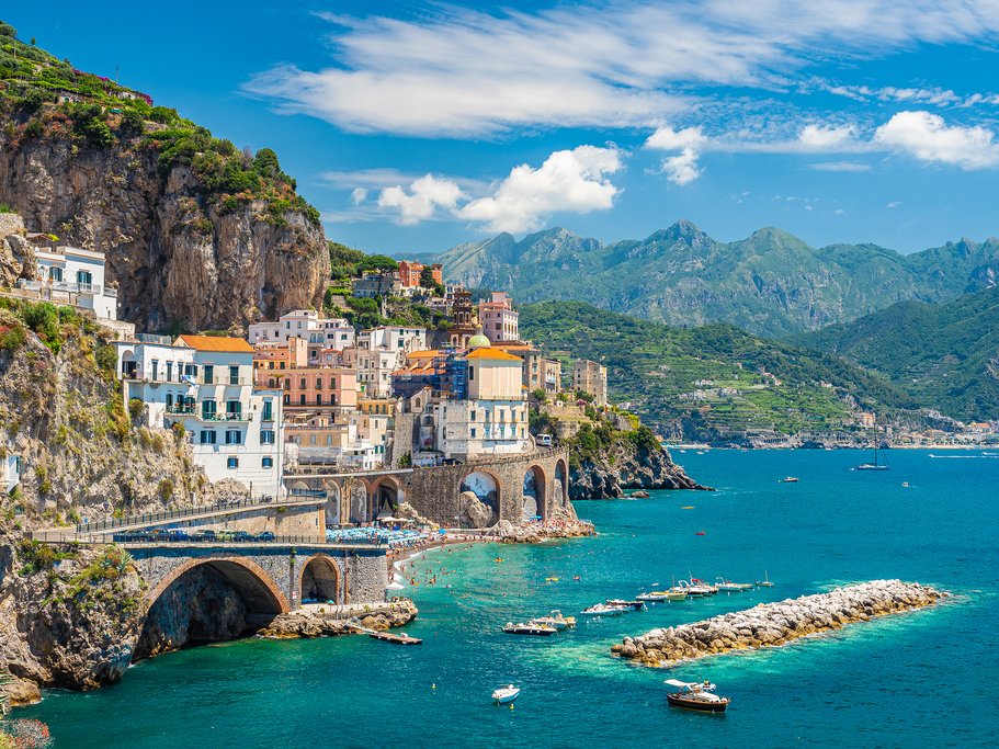Discover the enchanting beauty of the Amalfi Coast, where dramatic cliffs plunge into the sparkling waters of the Mediterranean Sea. Drive along the scenic coastline, visit picturesque villages clinging to the cliffs, and savor the flavors of authentic Italian cuisine in charming seaside trattorias.  ]]>