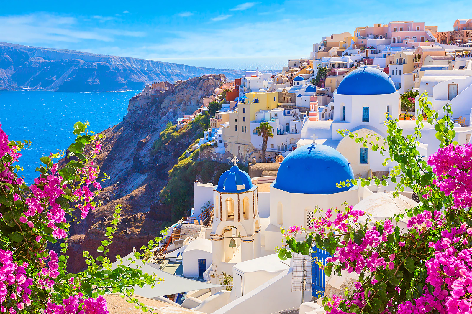 With its stunning sunsets, whitewashed buildings, and crystal-clear waters, Santorini continues to enchant travelers with its timeless beauty. Explore charming villages perched on cliffs, relax on black sand beaches, and savor delicious Mediterranean cuisine against the backdrop of the Aegean Sea.]]>