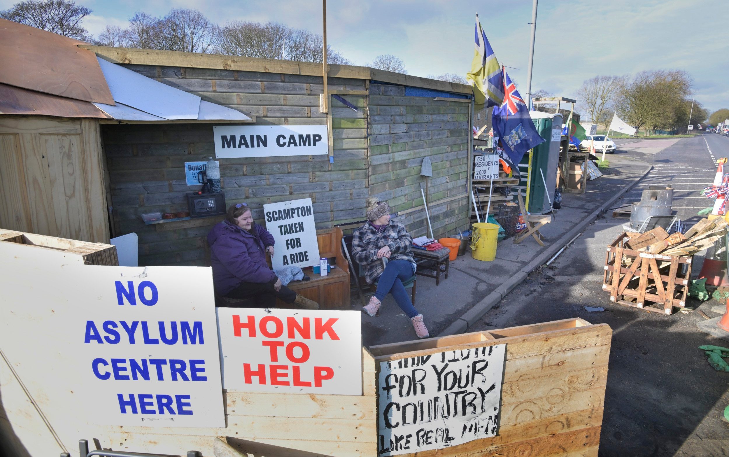 keir starmer and priti patel join forces to block migrant camp at former raf base