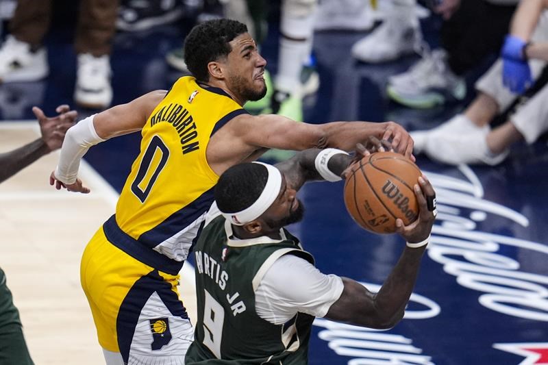haliburton breaks tie with 3-point play, pacers beats bucks 121-118 in ot to take 2-1 series lead