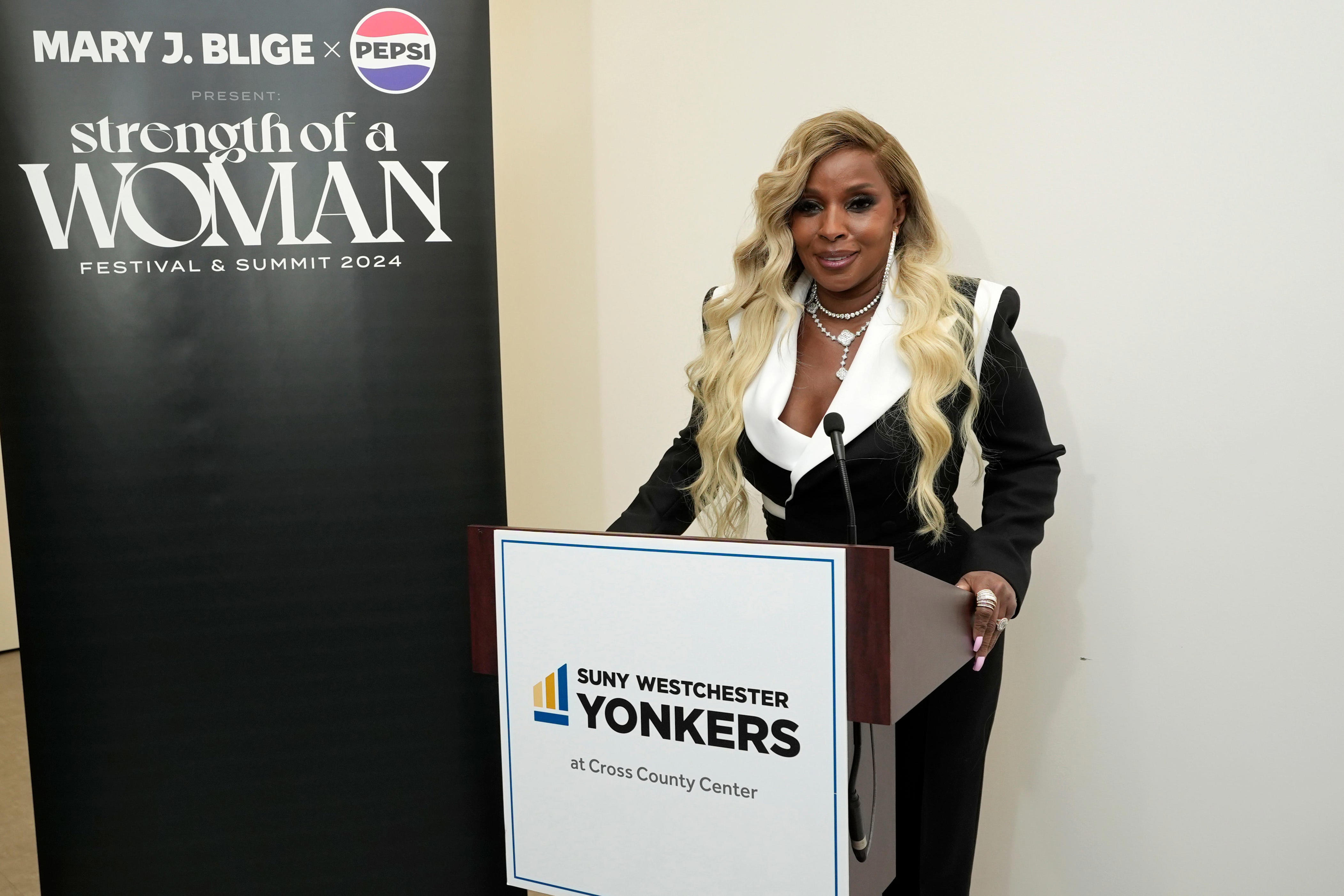 mary j. blige asserts herself with strength of a woman: 'allow me to reintroduce myself'