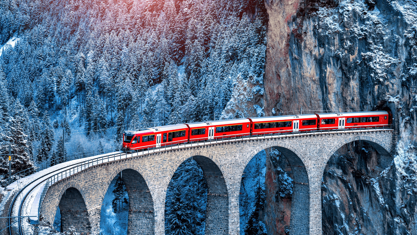 <p>The <a href="https://www.glacierexpress.ch/en/" rel="nofollow external noopener noreferrer">Glacier Express</a> route is as pretty as a postcard. This Swiss train travels between the mountain resort towns of Zermatt and <a href="https://whatthefab.com/st-moritz-summer.html" rel="follow">St. Moritz</a>. During the 8-hour-long train ride through the Alps, you can admire sweeping vistas and scenic canyons. Glacier Express is a spectacular European adventure at any time of year.</p><p>The train has seats and tables where you can enjoy food and drinks. Glacier Express is renowned for its culinary offerings. You can choose a single dish or a four-course feast, depending on your budget. </p>