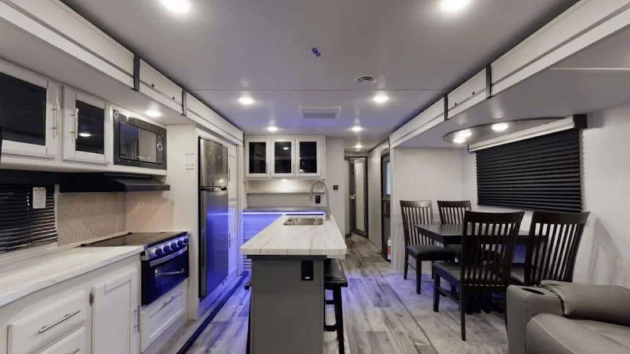 <p>Upgrading from a travel trailer to a fifth-wheel RV brings several advantages, particularly if you’re considering full-time RV living. Many fifth-wheel owners enjoy easier towing, more living space, and enhanced luxurious amenities. One popular layout is the rear kitchen fifth wheel, which optimizes the floor plan by placing the kitchen at the back of the unit. But is this layout the best fit for your camping needs?</p> <p>Let’s explore some of the top rear kitchen fifth wheels on the market!</p>