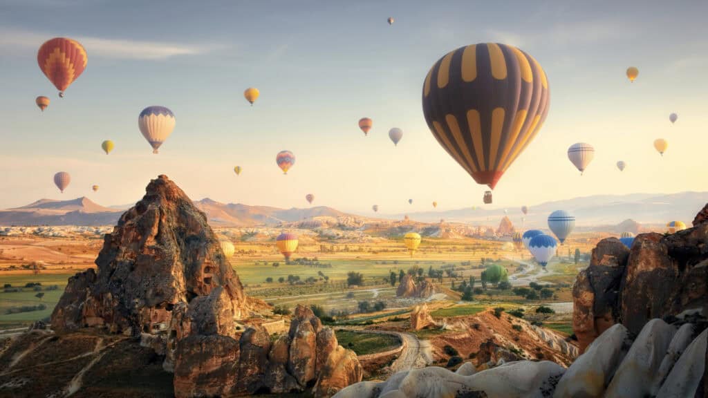 <p>Turkey is a huge country with a history almost as jaw-dropping as its landscapes. The list of memorable things to do there seems endless. Highlights include:</p><ul> <li>Touring ancient Ephesus,</li> <li>Watching hot air balloons rise into hazy skies above Cappadocia,</li> <li>Trekking in rugged mountain ranges,</li> <li>Soaking in natural hot pools,</li> <li>Exploring bustling cities like Ankara and Istanbul, and </li> <li>Swimming in Mediterranean seas.</li> </ul><p>Combine these attractions with the country’s sublime food and affordable prices, and Turkey is hard to beat.</p>
