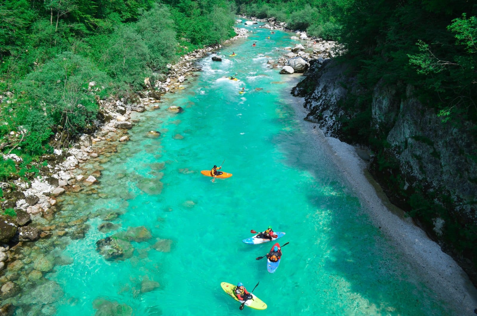 <p class="wp-caption-text">Image Credit: Shutterstock / Masa Drgan</p>  <p><span>The Soca River in Slovenia is renowned for its striking emerald green waters and the stunning alpine scenery through which it flows. This beautiful river offers a range of paddling experiences, from tranquil stretches perfect for beginners and families to more turbulent sections that challenge even seasoned canoeists and kayakers. The Soca Valley, with its lush forests, rugged mountains, and charming Slovenian villages, provides a picturesque setting for camping and outdoor activities. The river is also rich in history, having been a frontline during World War I, with several historical trails and museums in the area dedicated to this period.</span></p>