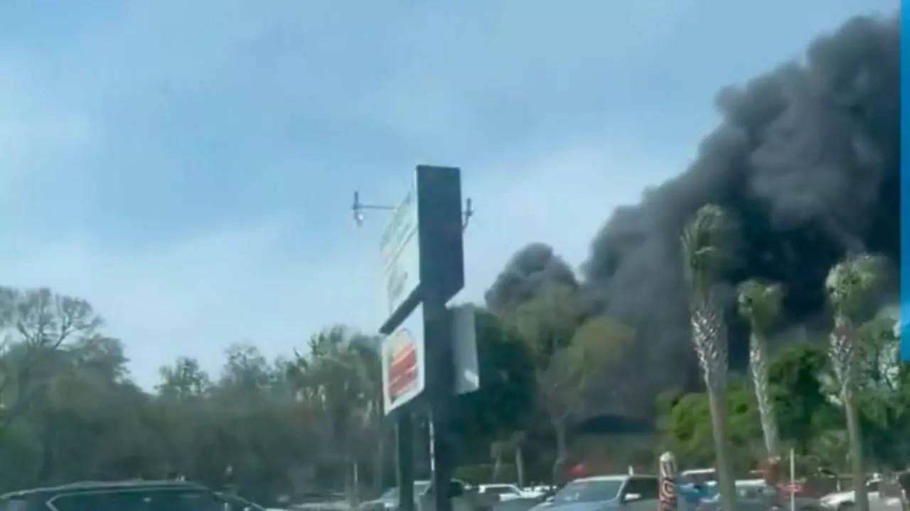 tailfins waterfront grill, destin, fire: videos show large blaze at florida restaurant