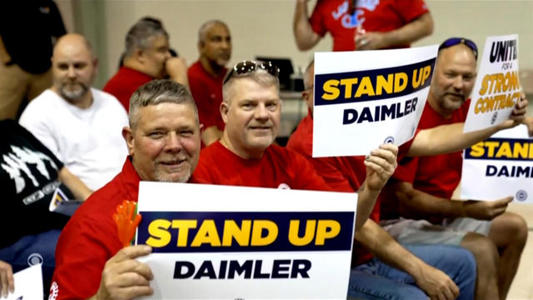 UAW reaches labor deal with Daimler Truck, averting strike<br><br>