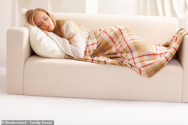 can't sleep? ditch the duvet and just snuggle under a heavy blanket