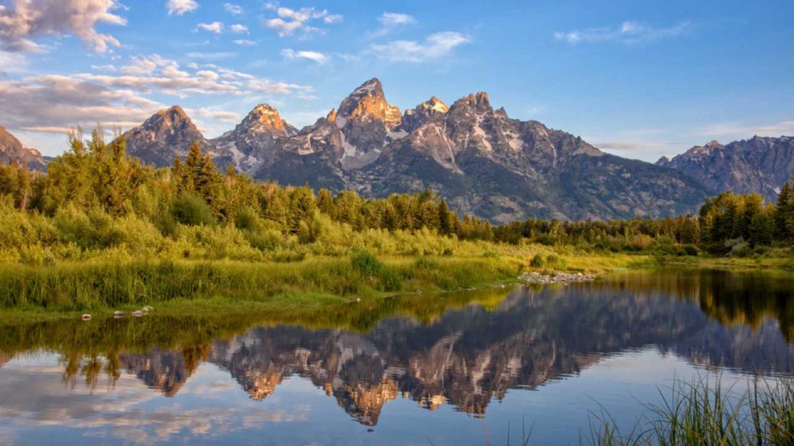<p>Jackson Hole doesn’t sound like a nice place, but that’s not the case. This area in Wyoming has some of the most splendid mountain resorts in the country. It offers a luxury experience among some of the prettiest peaks in the world.</p><p>You can see mountain wildlife, visit the highly-rated spas, eat at fine dining locations, attend rodeos, and more. The town is filled with adventure but also has art galleries, stores, and other in-town amenities for couples who want a calmer vacation.</p>