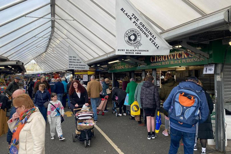 Man v Food star Adam Richman heaps praise on family-run stall at Bury ...