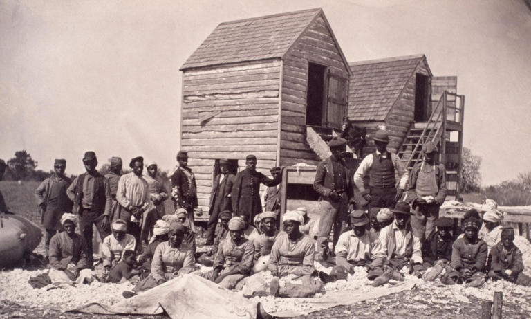 A group of people who escaped slavery during the civil war on the former plantation of Thomas Drayton, a Confederate general. Photograph: Historical/Corbis/Getty Images