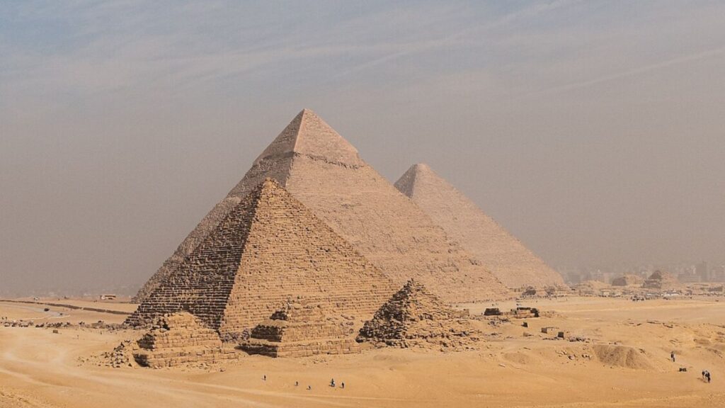 <p>Standing in the shadow of these ancient wonders is a humbling experience. There’s a reason there’s so much hype around them. Their scale and age defy easy comprehension. Exploring the Great <a class="wpil_keyword_link" href="https://www.newinterestingfacts.com/facts-on-the-egyptian-pyramids/" title="Pyramid">Pyramid</a> of Khufu, wandering through nearby tombs, and even venturing into the desert on a camel ride brings ancient Egypt vividly to life.</p><p>Go during the cooler shoulder season months to avoid the most intense heat. For a well-rounded Egyptian experience, combine your visit to the pyramids with exploring Cairo’s Islamic architecture and vibrant markets.</p>