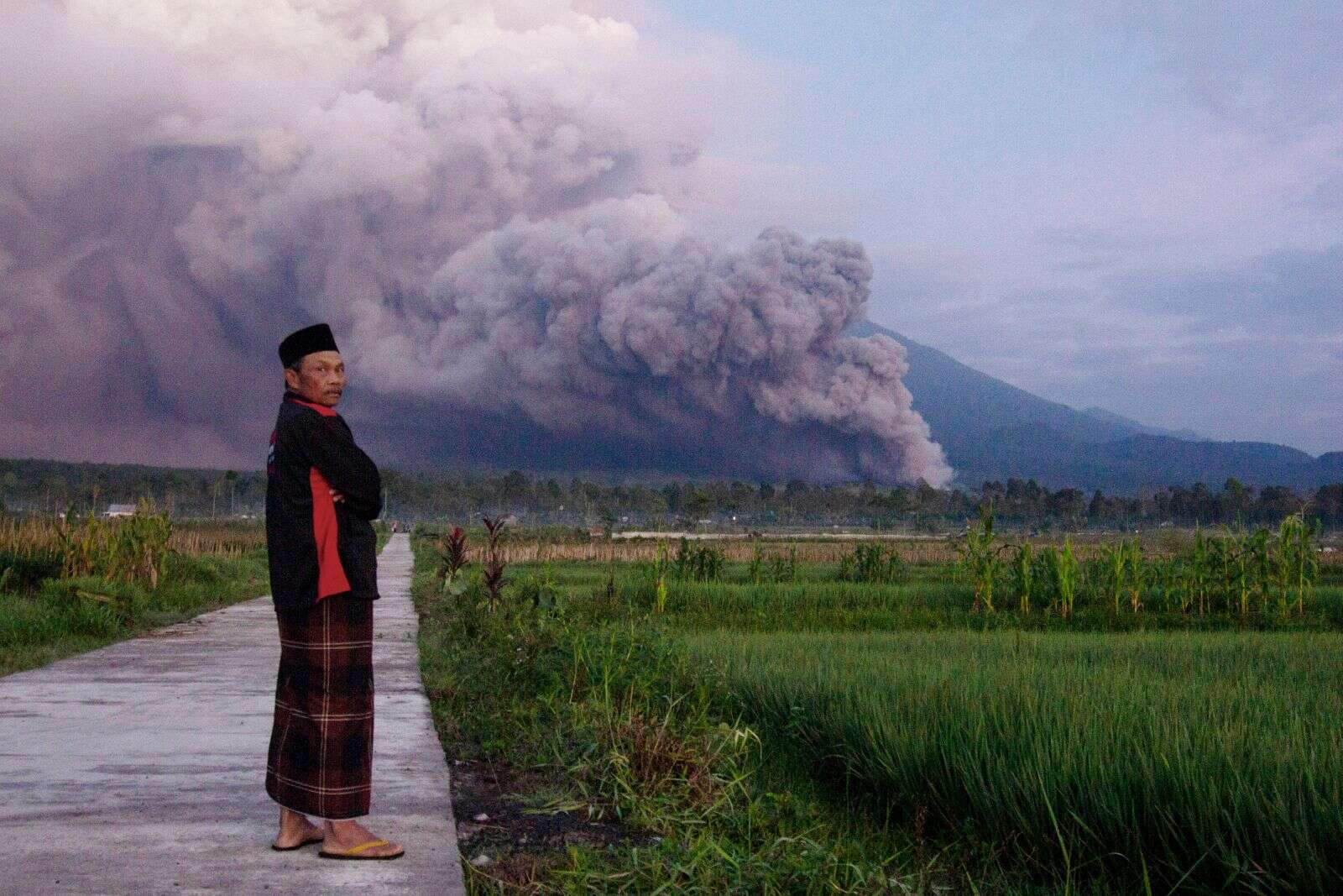 volcano erupts in eastern indonesia, spews miles-high ash tower