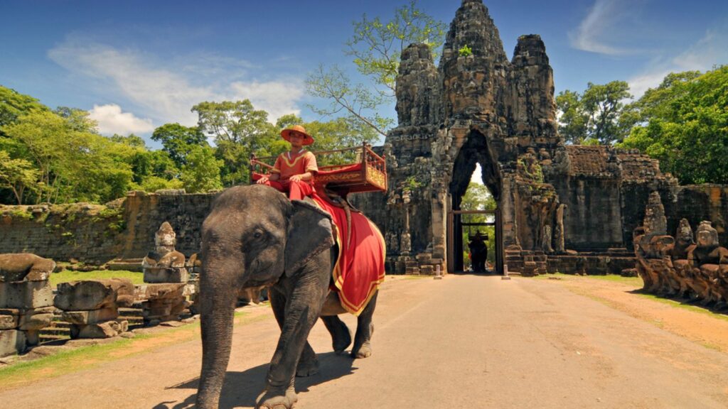 <p>This sprawling <a href="https://www.smithsonianmag.com/smart-news/13th-century-angkor-was-home-more-people-boston-today-180977719/">temple</a> complex is the epitome of jungle-clad ruins. Echoes of the once-mighty Khmer Empire surround you. Wandering through crumbling passageways, gazing at intricately carved reliefs, and the iconic tree roots entwined with temples evoke a sense of adventure and the fleeting nature of even the grandest civilizations.</p><p>To beat the crowds and the midday heat, arrive at Angkor Wat at sunrise and explore by bicycle. Angkor Wat is the most famous temple, but dozens more dot the area, offering even more discoveries.</p>
