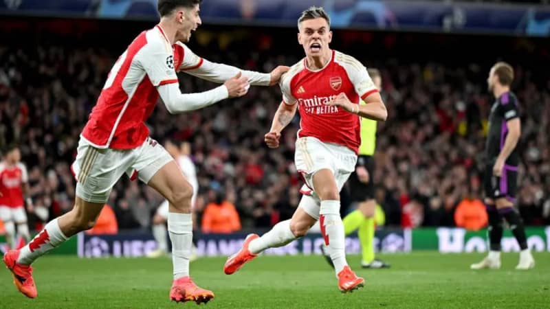 epl: arsenal edge tottenham 3-2 to open gap at top of table