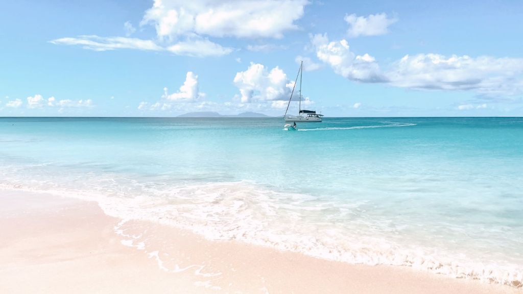 <p>You’re probably not surprised to see the Caribbean on this list. After all, the Caribbean is home to some of the best tropical beaches in the world. Shoal Bay, Antigua, is a top place to visit in May. Here, you’ll find almost 2 miles (3 kilometers) of crystal-clear blue water, <a href="https://worldwildschooling.com/colorful-coral-reefs-for-snorkeling/">coral reefs teeming with marine life</a>, and a long stretch of white sand beach flanked by palm trees. </p><p>Aside from being the ultimate place to relax in 86°F (30°C) heat in May, Shoal Bay is a hub for snorkeling and diving. If that’s not quite your thing, maybe a relaxing boat tour is instead. On the other hand, you could just stay at the beach and relax at one of the bars and restaurants while admiring the views. </p><p class="has-text-align-center has-medium-font-size">Read also: <a href="https://worldwildschooling.com/most-beautiful-beaches-in-the-world/">Most Beautiful Beaches in the World</a></p>