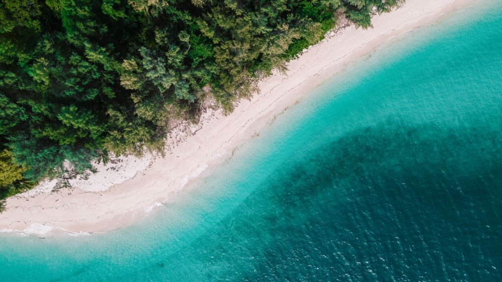 <p>Picking the best beach in Thailand is almost impossible. However, Koh Kradan is hard to beat when it comes to finding the perfect balance of warm weather (89.6°F/36°C in May), a laid-back lifestyle, a glorious golden sand beach, and turquoise waters. </p><p>Koh Kradan is only a small island in Southern Thailand, but it’s widely regarded as one of the <a href="https://worldwildschooling.com/paradise-islands/">most beautiful islands</a> in the Trang province. When you’re not walking along this sandy beach or hiking through its surrounding forest in search of the best views, you’ll enjoy kayaking around the island, snorkeling in the sea, and taking a boat trip along the coast.</p><p class="has-text-align-center has-medium-font-size">Read also: <a href="https://worldwildschooling.com/exotic-beaches/">Top Exotic Beach Destinations</a></p>