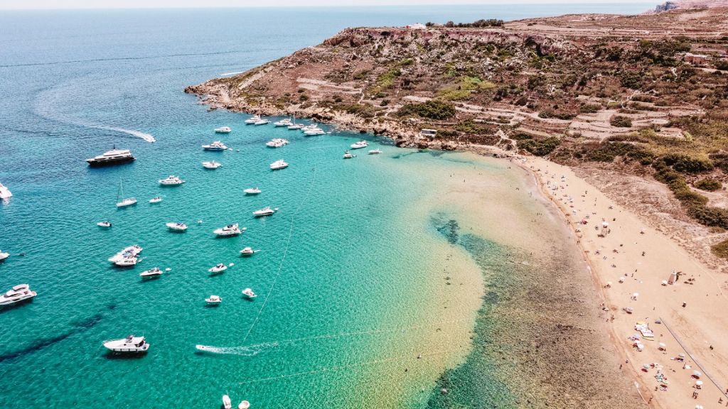 <p>May is the perfect time to visit Gozo, Malta, for a beach vacation. The tourist season hasn’t yet arrived, but the weather is still favorable, with daily temperatures of 75.2°F (24°C). For a peaceful beach retreat in Gozo, visit Ramla Beach on the island’s northeast coast.</p><p>Here, you’ll find a <a href="https://worldwildschooling.com/hidden-beaches-in-europe/">quiet beach</a> with few amenities – toilets, a handful of cafes, an ice cream van, deck chairs, and umbrellas – a spacious stretch of ochre sand and beautifully blue turquoise waters. With very little to do at Ramla Beach besides snorkeling and swimming, no excuse is needed to sit back, relax, and watch the world go by. </p><p class="has-text-align-center has-medium-font-size">Read also: <a href="https://worldwildschooling.com/hot-beach-destinations-in-europe-in-may/">Hot European Beach Destinations in May</a></p>