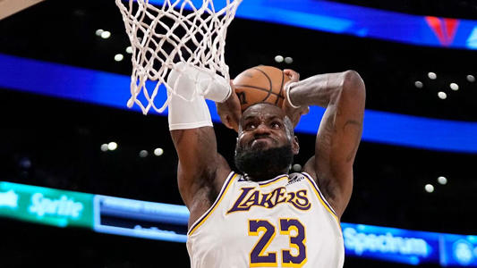 LeBron James opts out of Lakers contract two days after team drafts son Bronny, agent says<br><br>