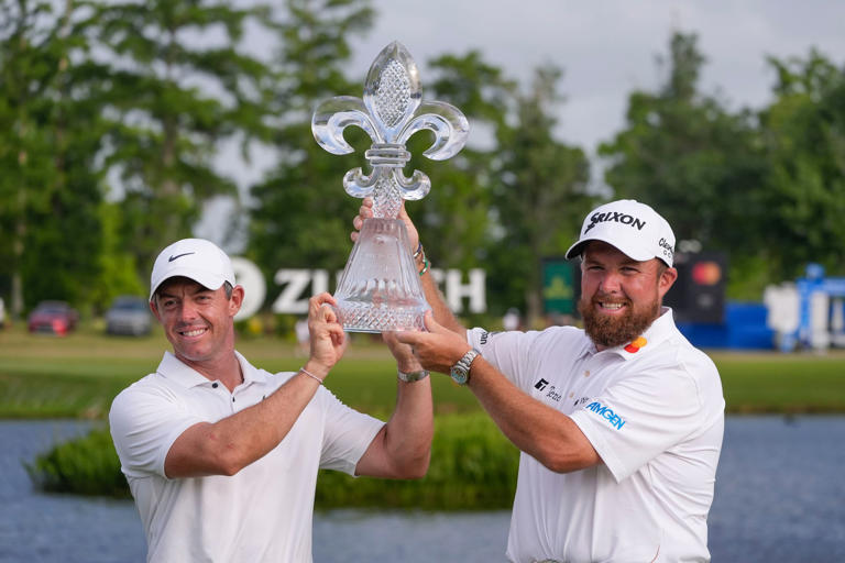 Rory McIlroy (left) and teammate Shane Lowry were all smiles after winning the PGA Zurich Classic golf tournament at TPC Louisiana in Avondale, La.