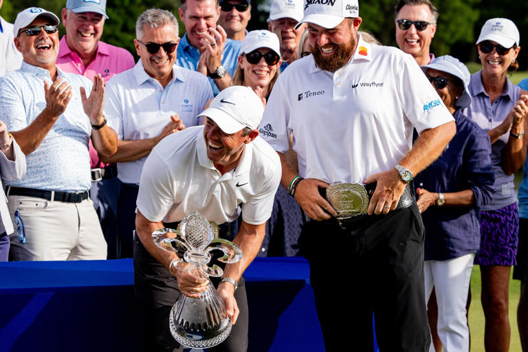 Rory McIlroy shares a laugh with Shane Lowry about his belt not fitting properly after winning the 2024 Zurich Classic of New Orleans. (Photo: Stephen Lew-USA TODAY Sports)