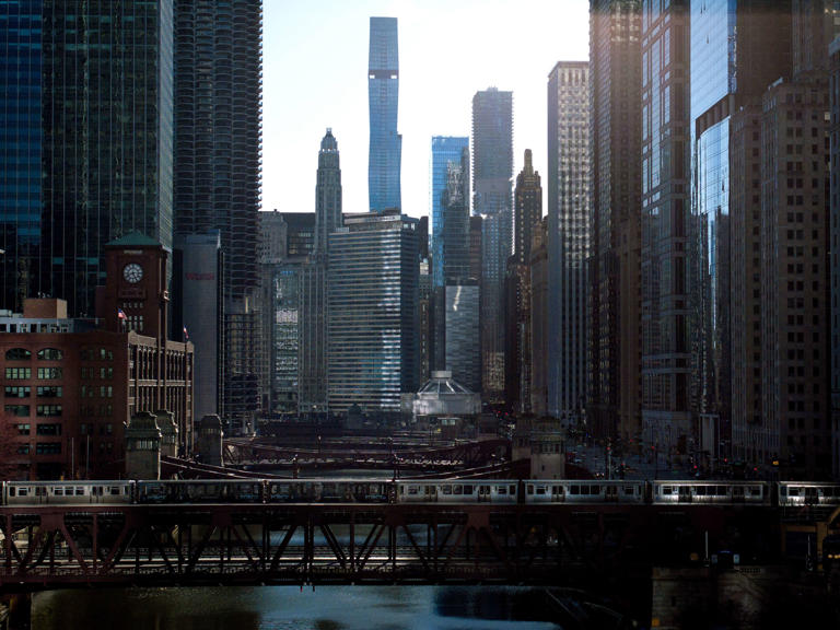 A CTA train crosses the Chicago River over the Wells Street Bridge on April 6, 2024.