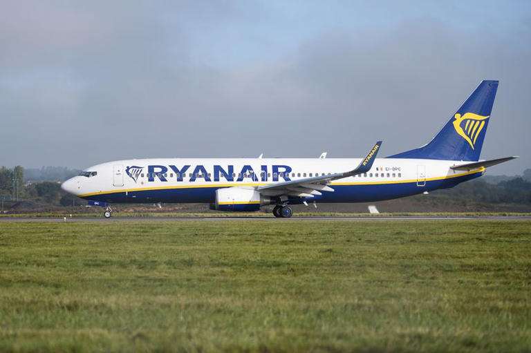 A Ryanair passenger plane taxis on the runway at Luton airport. (Photo by Leon Neal/Getty Images)