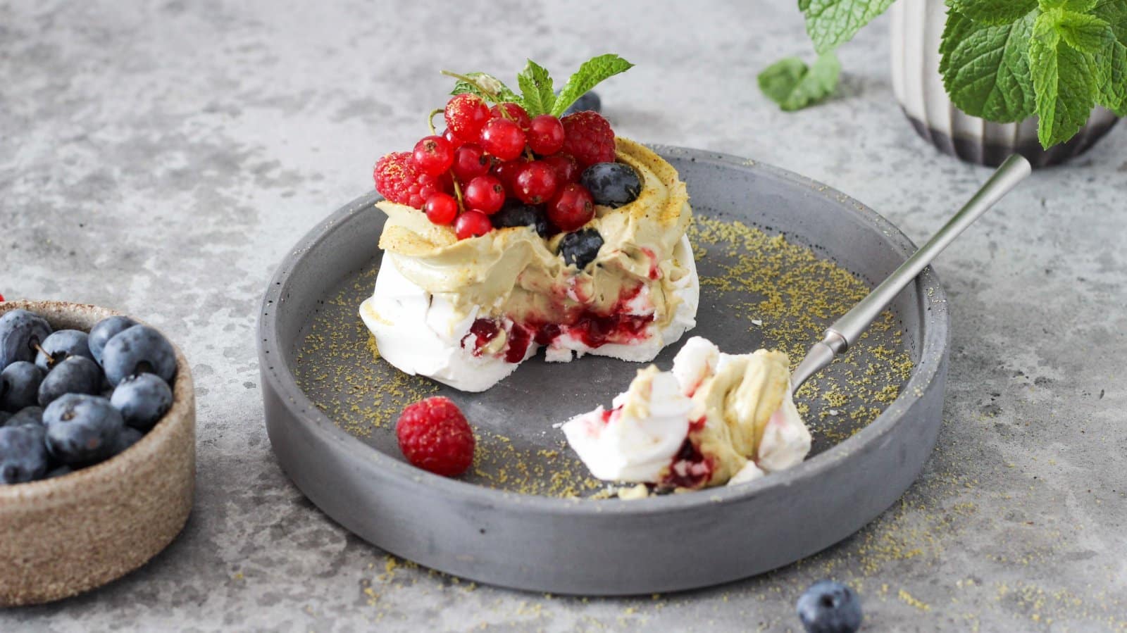 Image Credit: Shutterstock / Luba Kuzmicheva <p><span>Crisp meringue outside, soft marshmallow inside, topped with fresh fruit and cream, Pavlova is a dessert that’s as beautiful as it is delicious.</span></p>