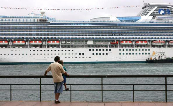 FILE PHOTO: SYDNEY, AUSTRALIA: The Sapphire Princess docks at Circular Quay December 23, 2004 in Sydney, Australia. The Sapphire Princess is one of the ships where a norovirus outbreak was reported.
