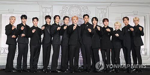 K-pop boy group Seventeen poses for photos during a press conference in Seoul on April 29, 2024, to mark the release of a compilation album titled 