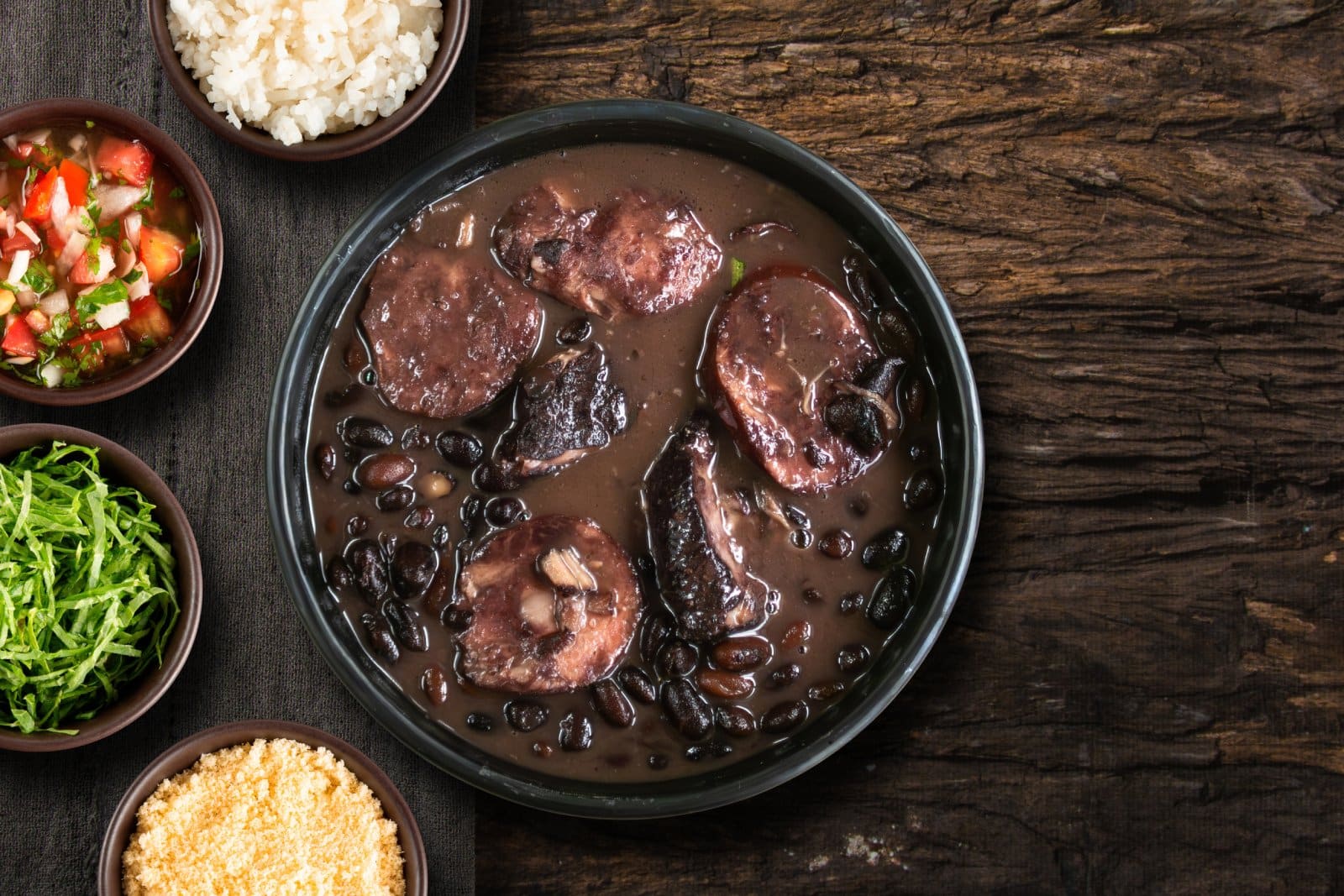 Image Credit: Shutterstock / gustavomellossa <p><span>A hearty stew of black beans with pork or beef, feijoada is the soul of Brazilian cuisine, reflecting its rich history and cultural diversity.</span></p>
