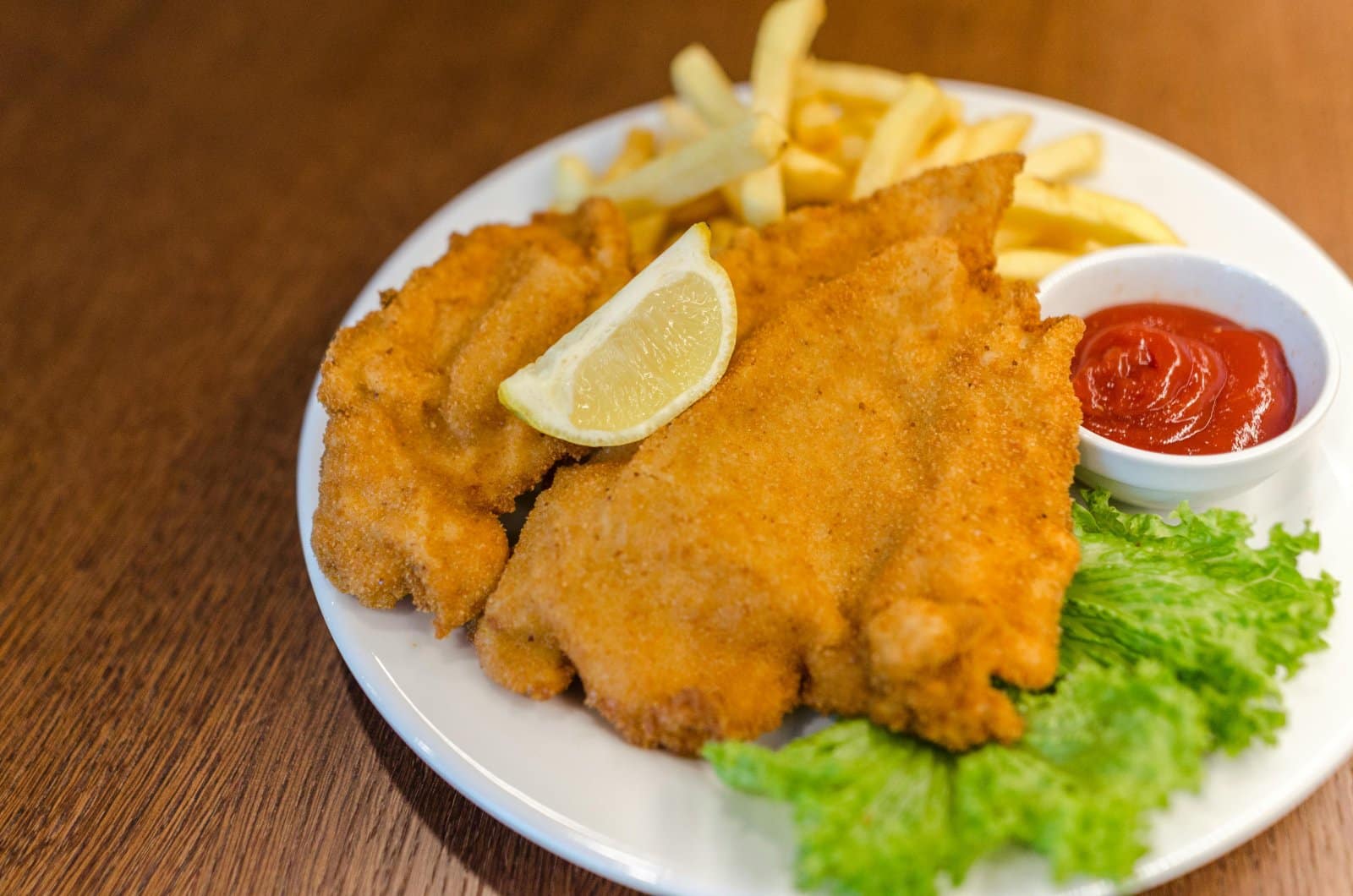 Image Credit: Pexels / Lukas <p><span>Thin, breaded, and pan-fried veal or pork cutlet, Schnitzel is a simple yet satisfying dish, best served with a lemon wedge and potato salad.</span></p>