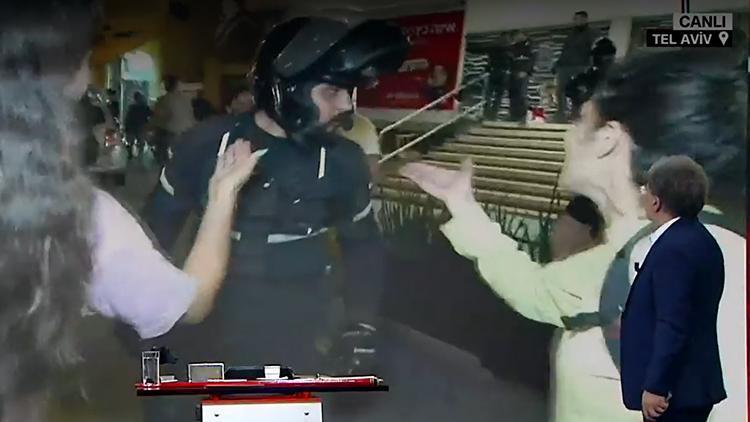 tel aviv'de sokaklar karıştı! i̇srail polisinden cnn türk yayına müdahale