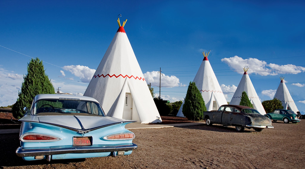 One of the few remaining Wigwam Villages along Route 66, this quirky motel features teepee-shaped rooms that harken back to the heyday of American roadside culture.]]>