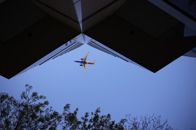 A Southwest Airlines plane heads to Norman Y. Mineta San Jose International Airport over downtown San Jose, Calif., on Monday, April 15, 2024.
