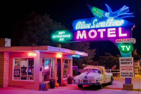 A well-preserved example of a classic Route 66 motel, the Blue Swallow Motel in Tucumcari offers travelers a step back in time with its retro neon sign and vintage charm.]]>