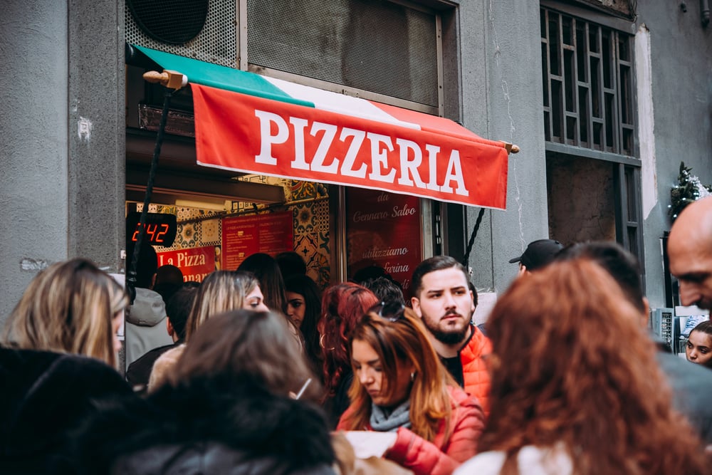 <p>Naples is the birthplace of pizza, and it shows. The city is home to some of the best pizzerias in the world, serving up classic <a href="https://travelswiththecrew.com/15-best-things-to-do-in-naples-italy/">Neapolitan-style pizza</a> with fresh mozzarella, San Marzano tomatoes, and a crispy, chewy crust. Some of the most famous pizzerias in Naples include Da Michele and Sorbillo. But even the lesser-known pizzerias in Naples are worth a visit – you never know when you’ll stumble upon a hidden gem.</p>