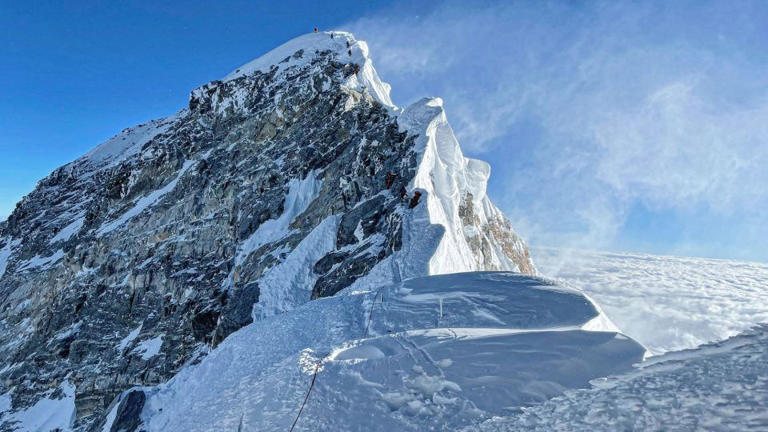 Mountaineers climbing the Hillary Step during their ascend of the South face to summit Mount Everest on May 31, 2021.