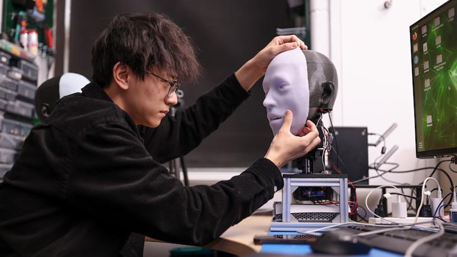 android, meet emo, a humanoid robot that can mimic facial expressions and smile before you do