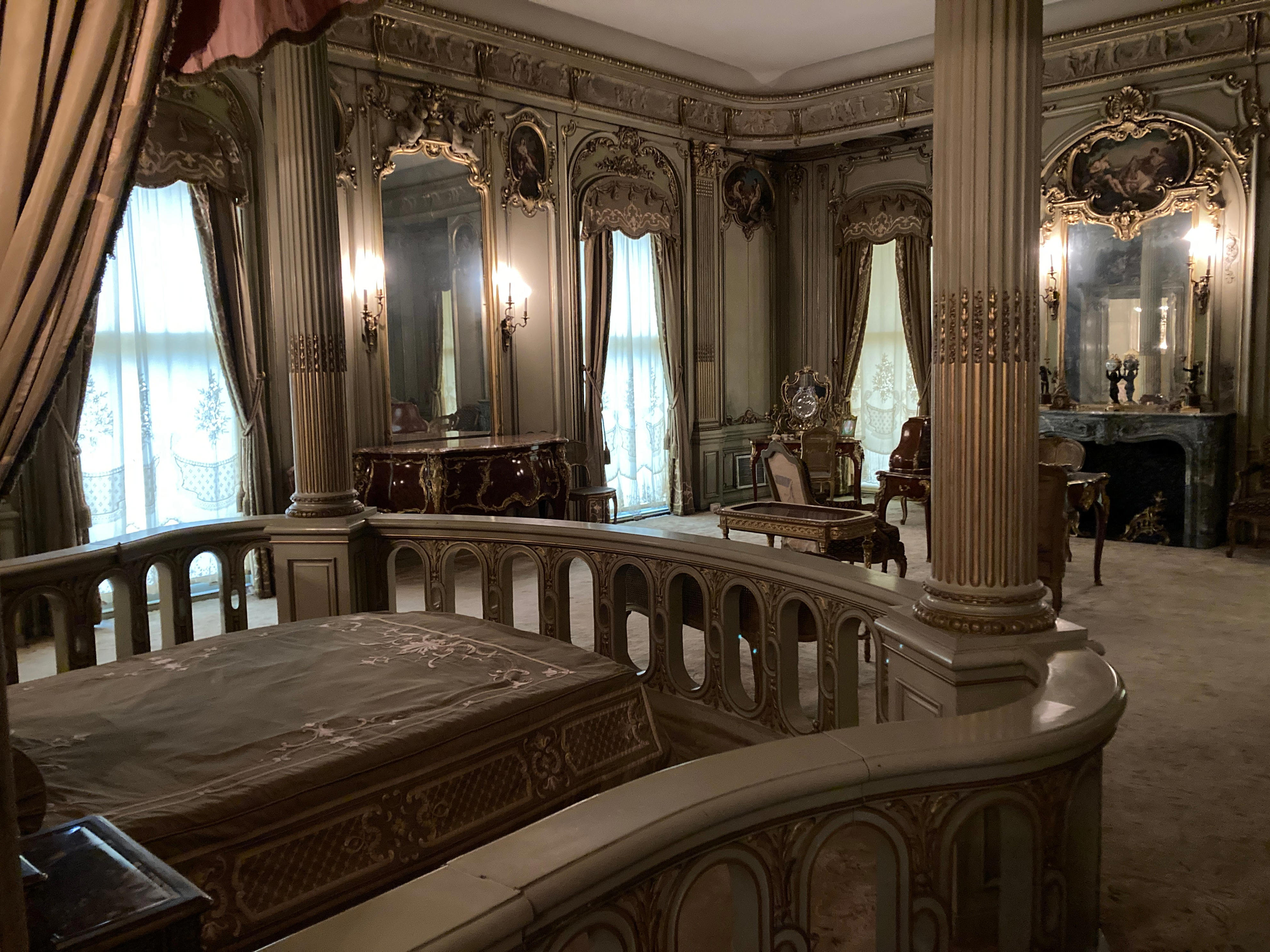 <p>In European palaces, railings around royal beds were utilized during daily ceremonies when a monarch woke up or during royal births. In Louise's bedroom, the railing was merely a decorative homage to the French architecture she loved.</p><p>Her room connected to Frederick's through an adjoining door. Frederick's room was closed for restoration when I visited.</p>