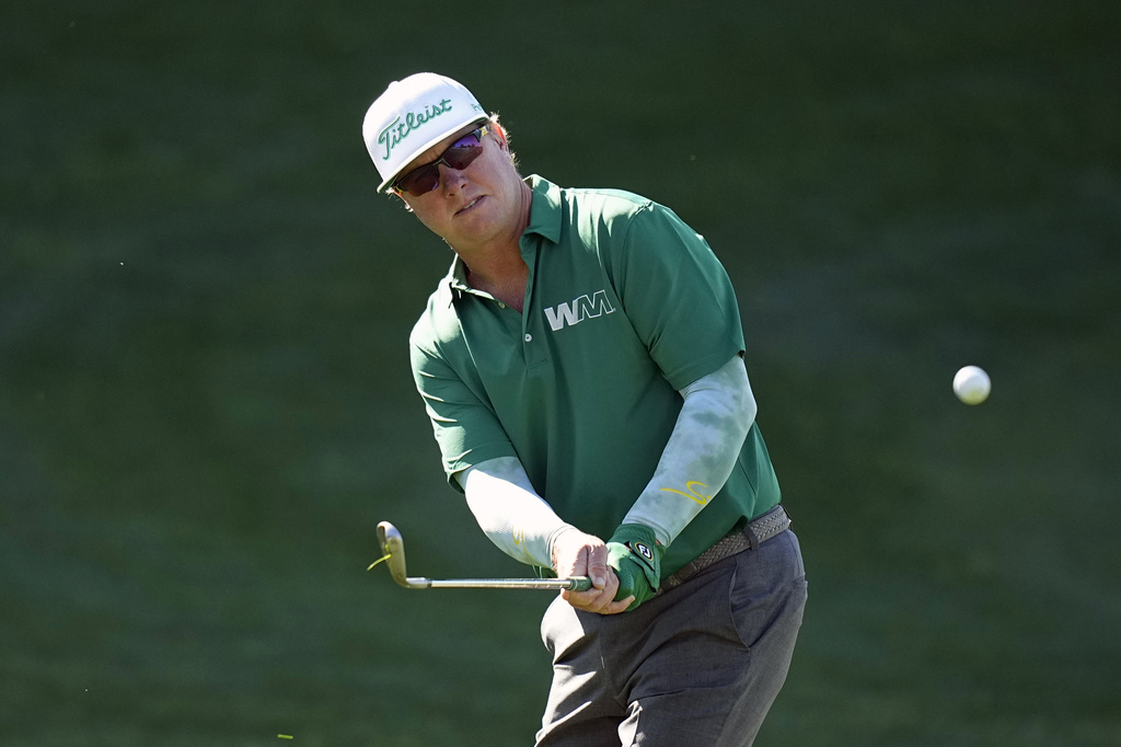 <p>Charley Hoffman chips on the 18th hole during the first round of the Texas Open golf tournament, Thursday, April 4, 2024, in San Antonio. </p>