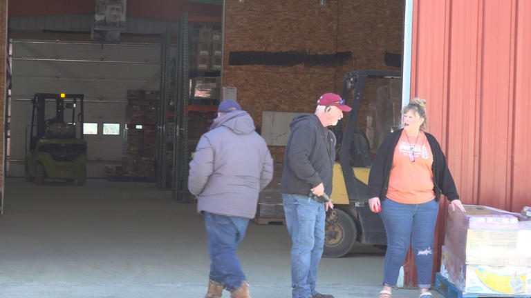 Dixie Shaw and others at the Hunger & Relief Services Warehouse in Caribou.