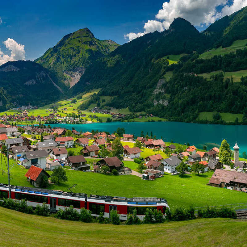 Panoramic View Of A Scenic Train Traveling Across Switzerland, Central Europe