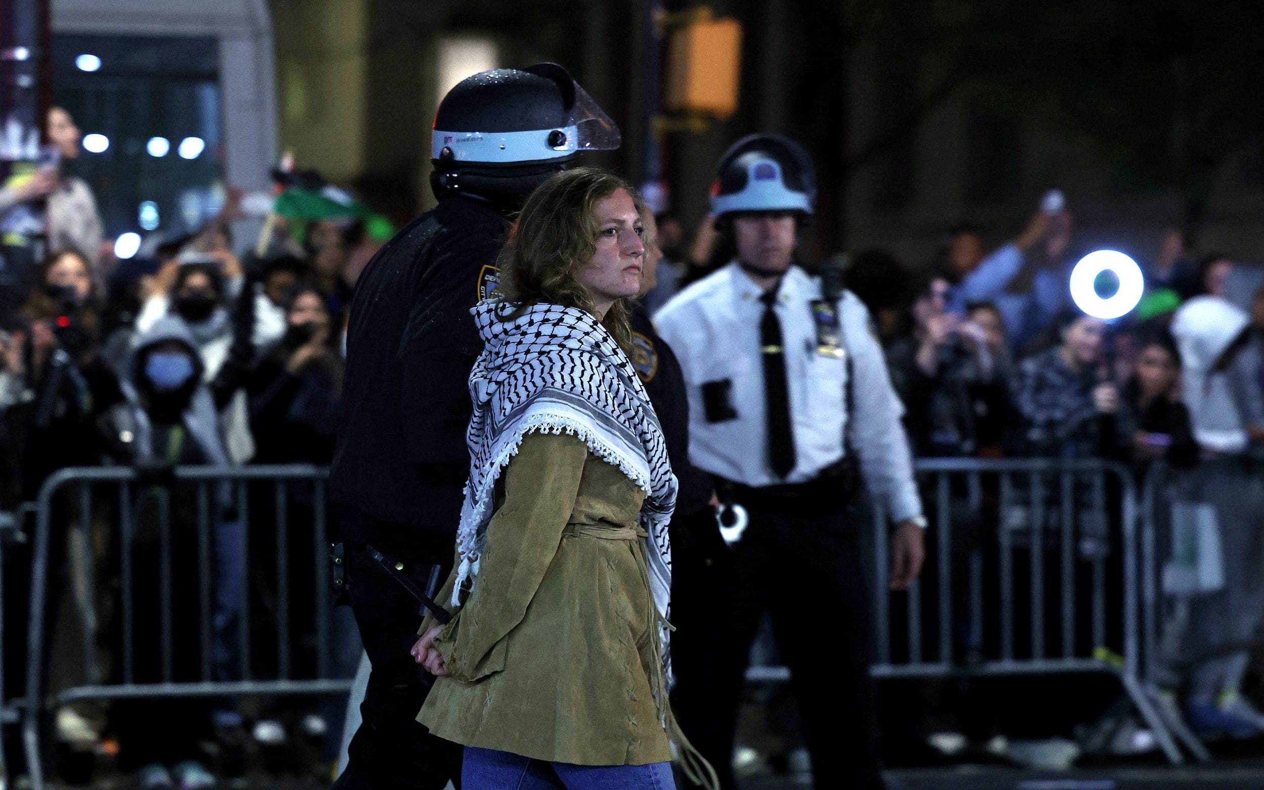 riot police storm columbia campus and drag pro-palestine protesters from barricade