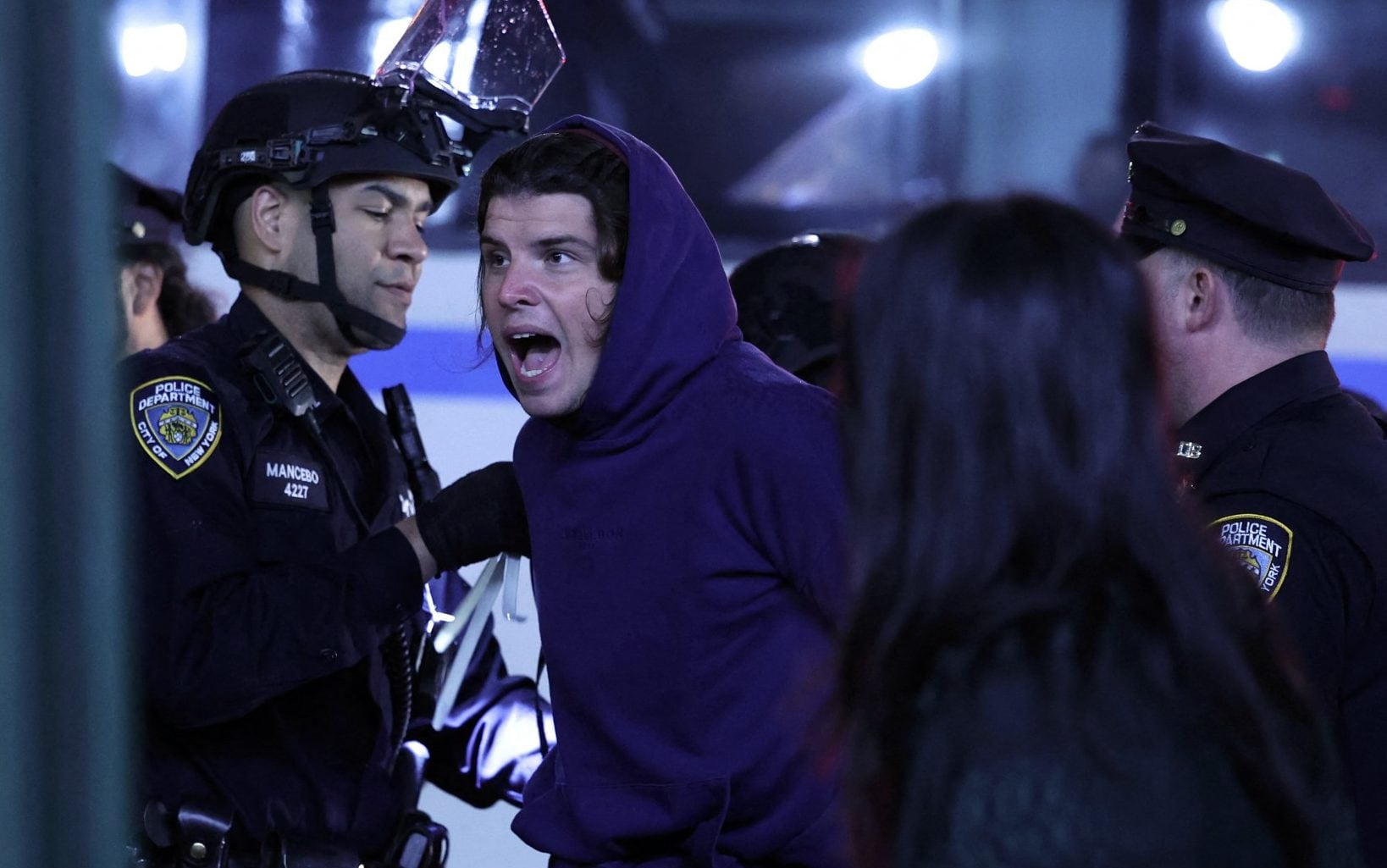 riot police storm columbia campus and drag pro-palestine protesters from barricade