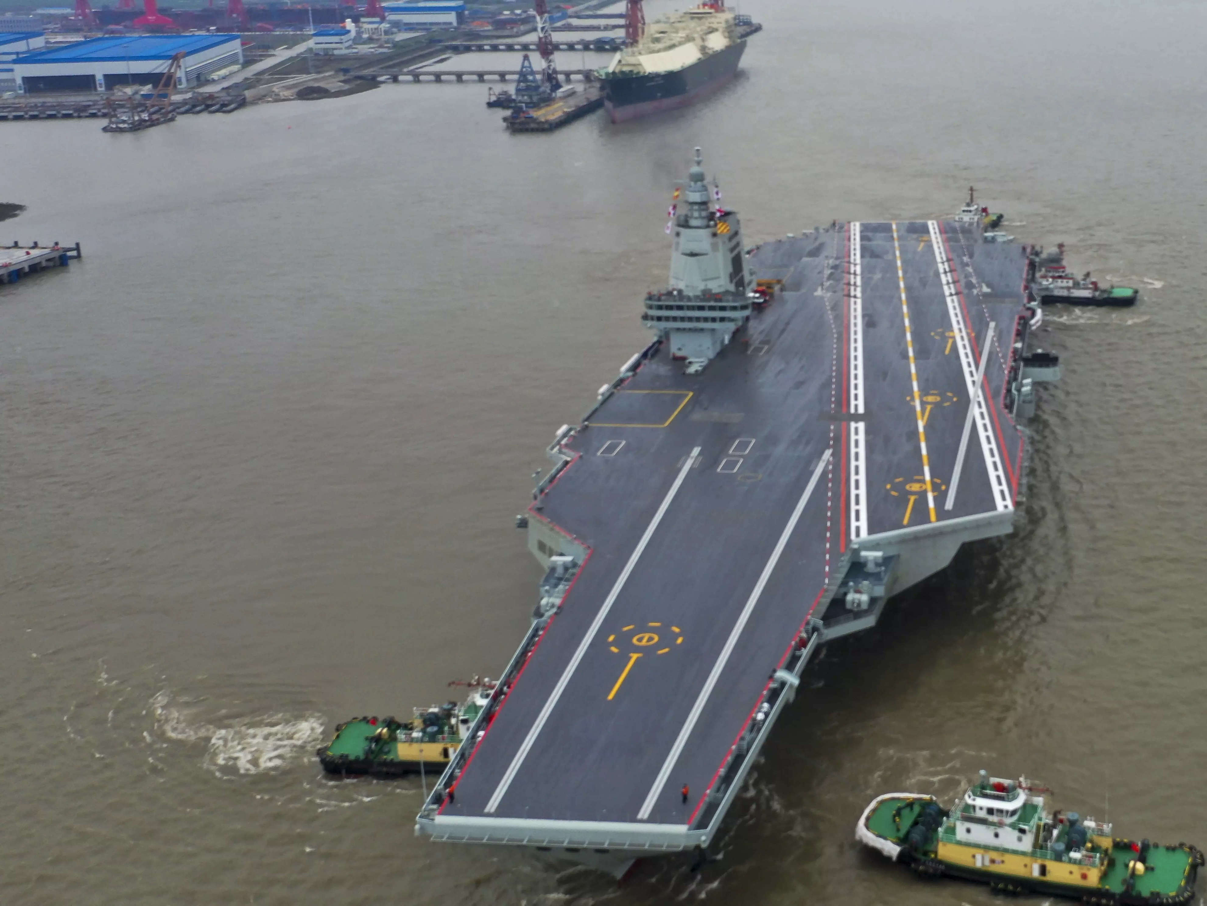 China’s New Naval Powerhouse: The Fujian Aircraft Carrier Sets Sail