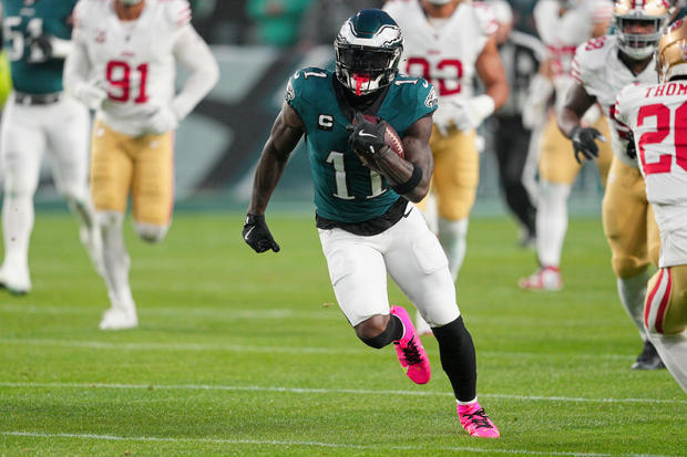 PHILADELPHIA, PA - DECEMBER 03: Philadelphia Eagles wide receiver A.J. Brown (11) picks up a first down during the game between the San Fransisco 49ers and the Philadelphia Eagles on Dec. 3, 2023 at Lincoln Financial Field. Andy Lewis/Icon Sportswire via Getty Images