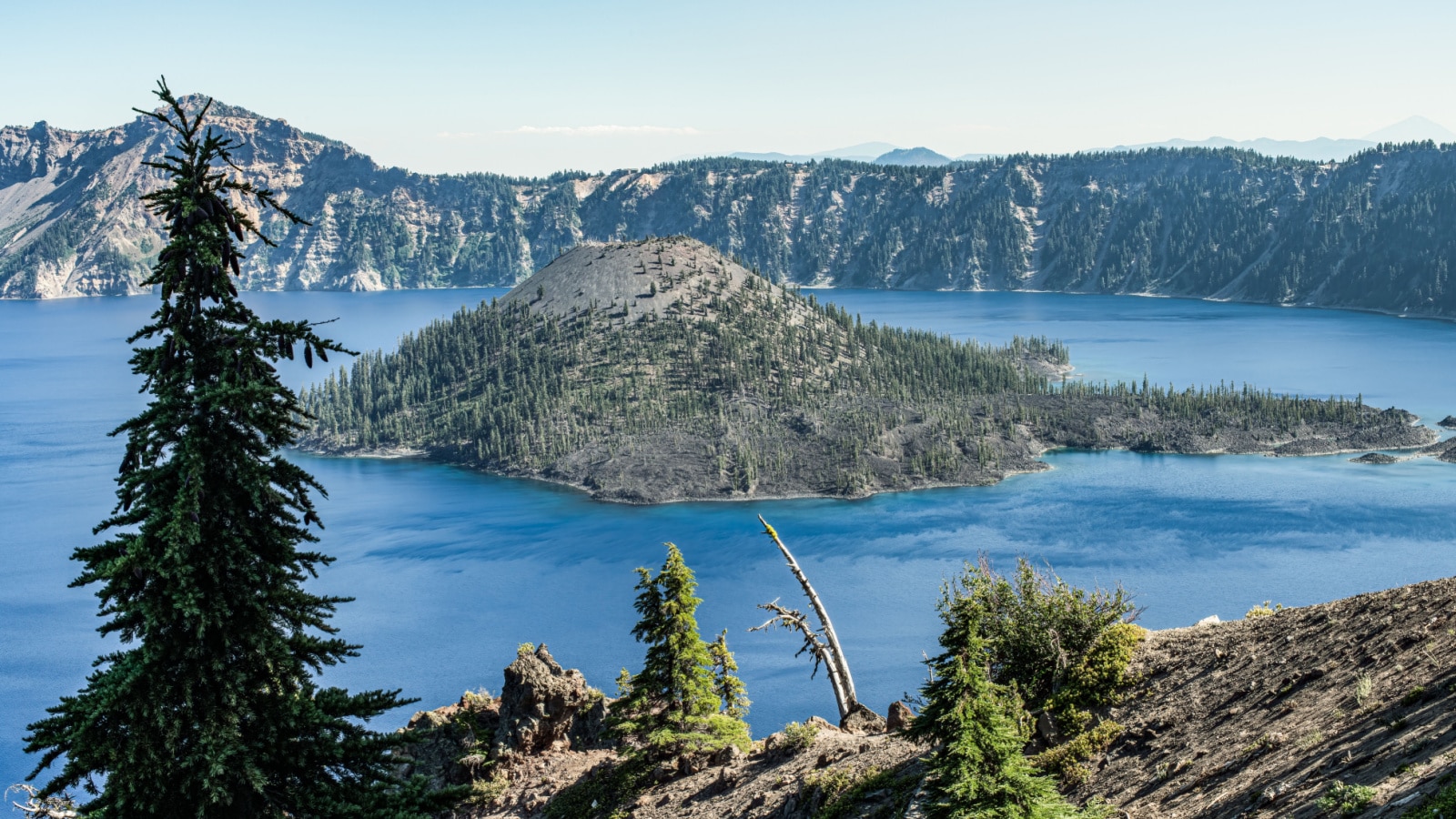 <p>Formed by the collapse of a volcanic caldera, Crater Lake is the deepest lake in the United States, known for its pristine blue waters and stunning panoramas from the rim.</p>